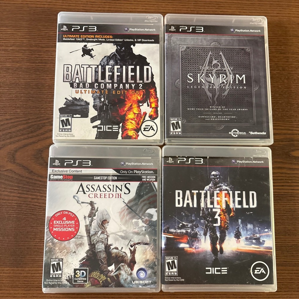Sony PS3 Video Game Lot 4 Skyrim Battlefield 3 Bad Company 2 Assassins Creed III